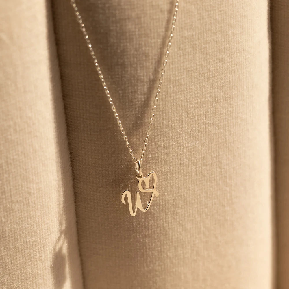 Collier femme  avec pendentif lettre